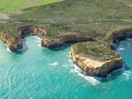 Coastal cliffs and surf on a three day Great Ocean Road package